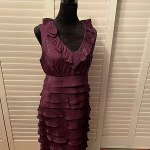 London Times-deep mauve iridescent ruffled layer dress.